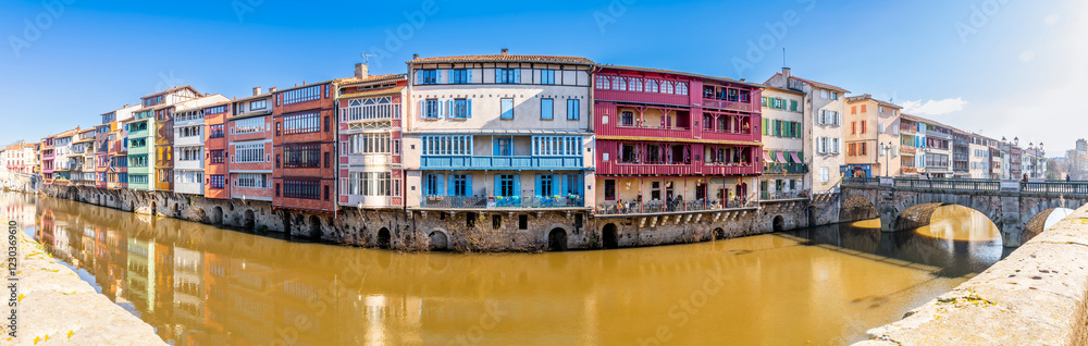 Facades of houses in the town of Castres on the Agout River in Occitanie, France Facades of houses in the town of Castres on the Agout River in Occitanie, France