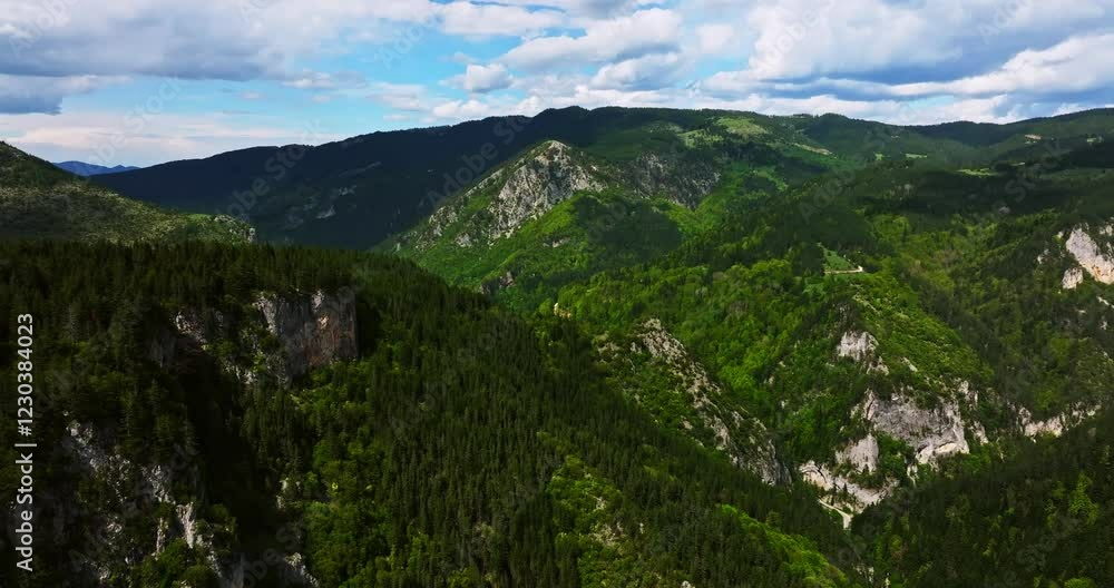 High Altitude Hillside Landscape On Mountain Top Aerial Drone Vibrant Cloudy Day