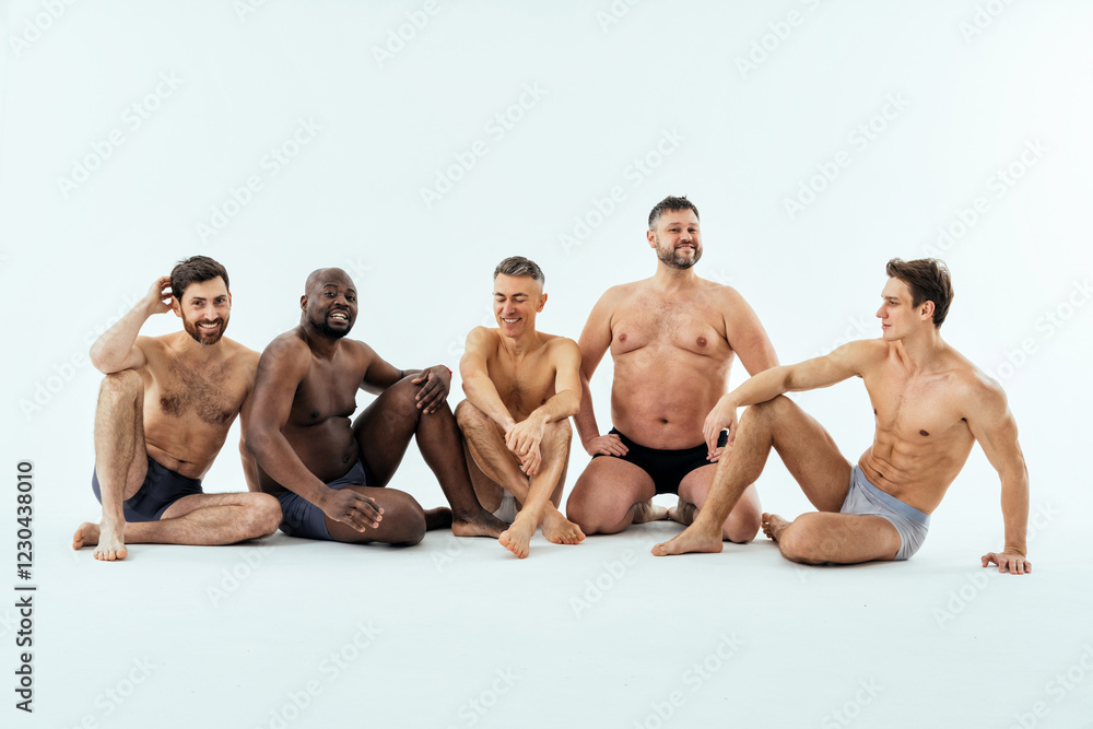 Obraz premium Group of multiethnic men posing for a male edition body positive beauty set. Shirtless guys with different age, and body wearing boxers underwear