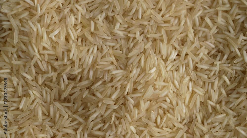 Macro video of Basmati rice. Heap of rice kept on rotating disk. Macro video of Basmati rice. Heap of rice kept on rotating disk.