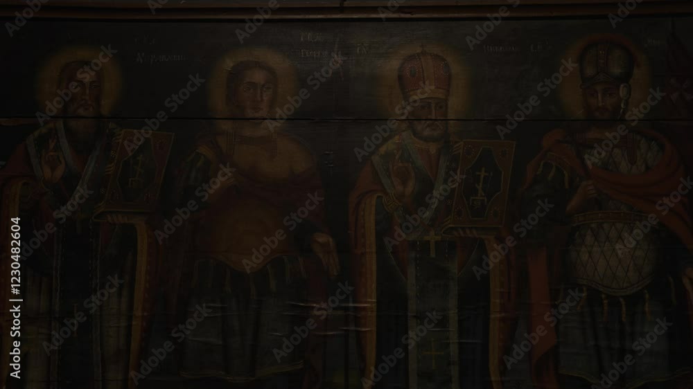 Old Icons on a Wooden Wall in a Church Old Icons on a Wooden Wall in a Church