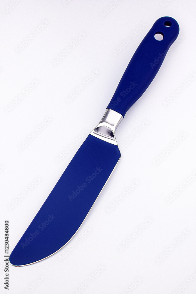 Blue-Handled Butter Knife on White Background Blue-Handled Butter Knife on White Background