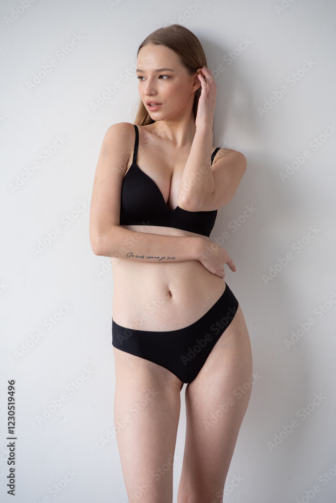 Casting snapshot of a fresh-faced model in simple black underwear, highlighting her natural features, body proportions, and confident stance. Ideal for agency scouting and professional portfolio updat Casting snapshot of a fresh-faced model in simple black underwear, highlighting her natural features, body proportions, and confident stance. Ideal for agency scouting and professional portfolio updat