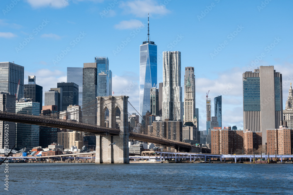 Naklejka premium A city skyline with a large bridge in the middle