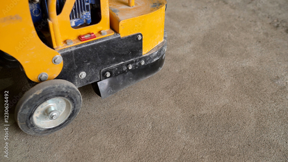 Obraz premium Concrete surface grinding machine smoothing industrial floor
