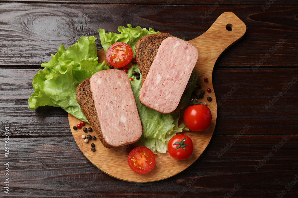 Tasty canned meat, bread, tomatoes, spices and lettuce on wooden table, top view Tasty canned meat, bread, tomatoes, spices and lettuce on wooden table, top view