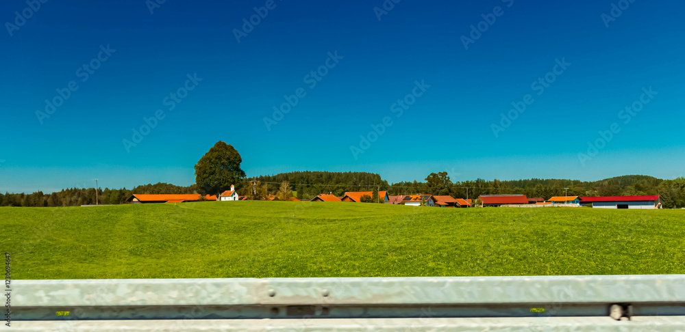 Fototapeta premium Alpine summer view with a church near Butzau, Steingaden, Weilheim-Schongau, Ostallgaeu, Bavaria, Germany