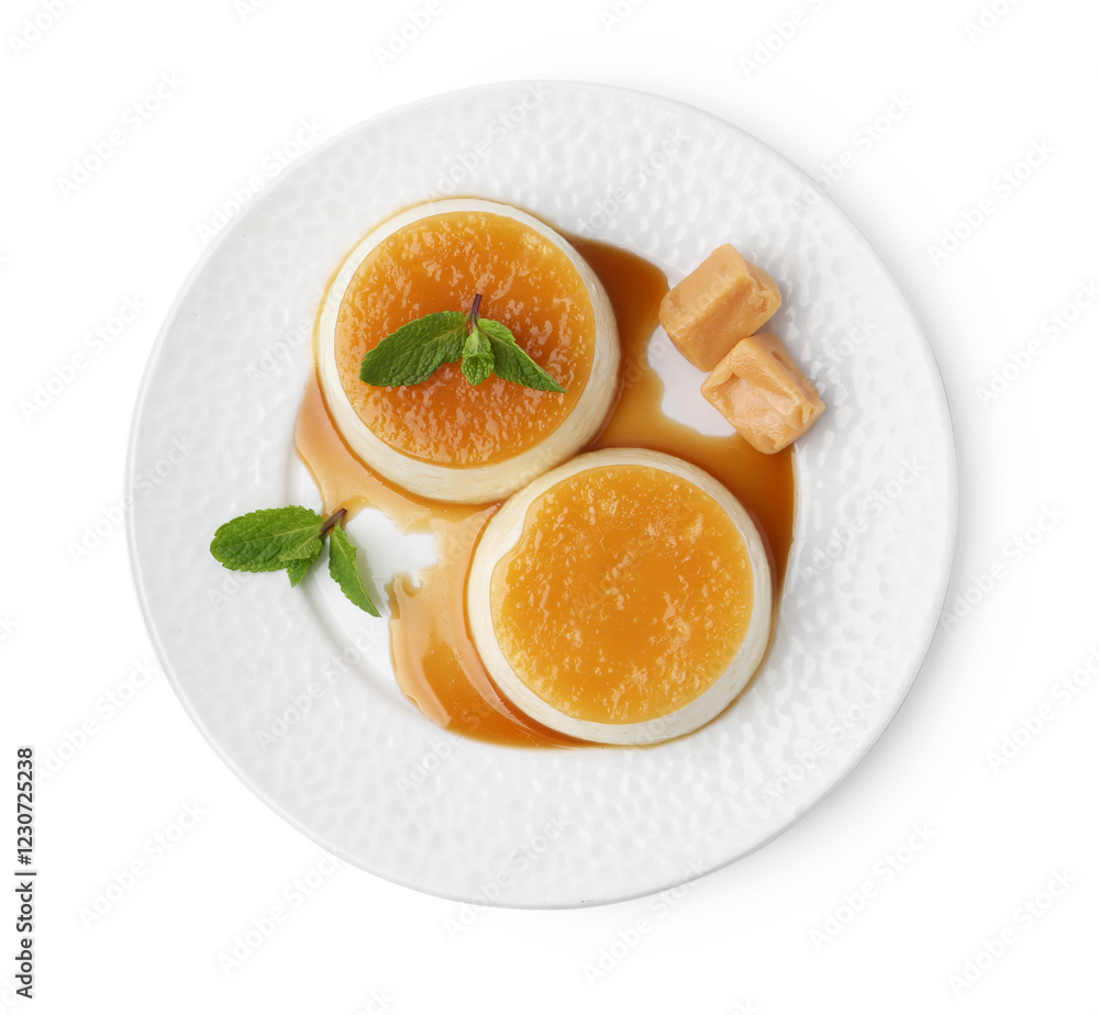 Tasty puddings with caramel sauce and mint isolated on white, top view Tasty puddings with caramel sauce and mint isolated on white, top view