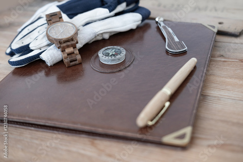 sailor's journal, Sailing Leather Gloves without fingertips for marine enthusiasts, seafaring life, compass, yacht captain accessories, adventure at sea, marine safety photo