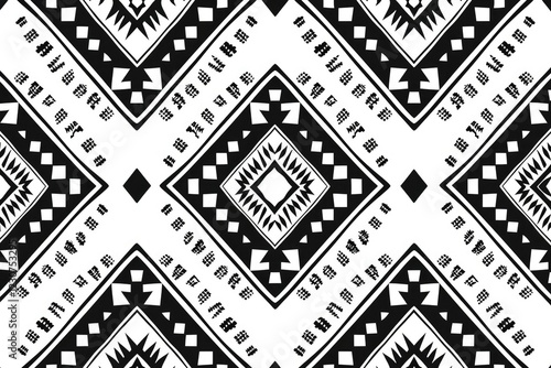 Wallpaper Mural Black and white geometric pattern with diamond and arrow motifs, creating a striking ethnic textile design. Torontodigital.ca