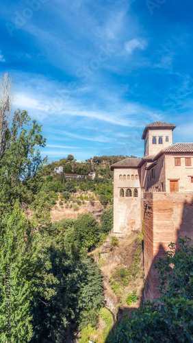 Alhambra with background of Generalife gardens and palace, Granada, Spain photo