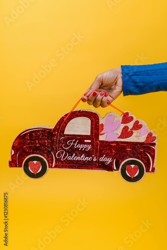 hand with car happy valentine day 