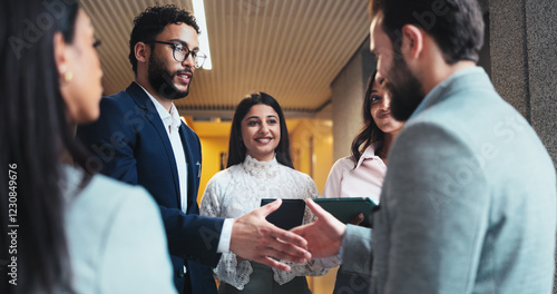 Smile, business people and shaking hands in office for greeting, b2b partnership or meeting. Handshake, cooperation and team introduction, welcome and hello at seminar hallway in hotel lobby at night photo