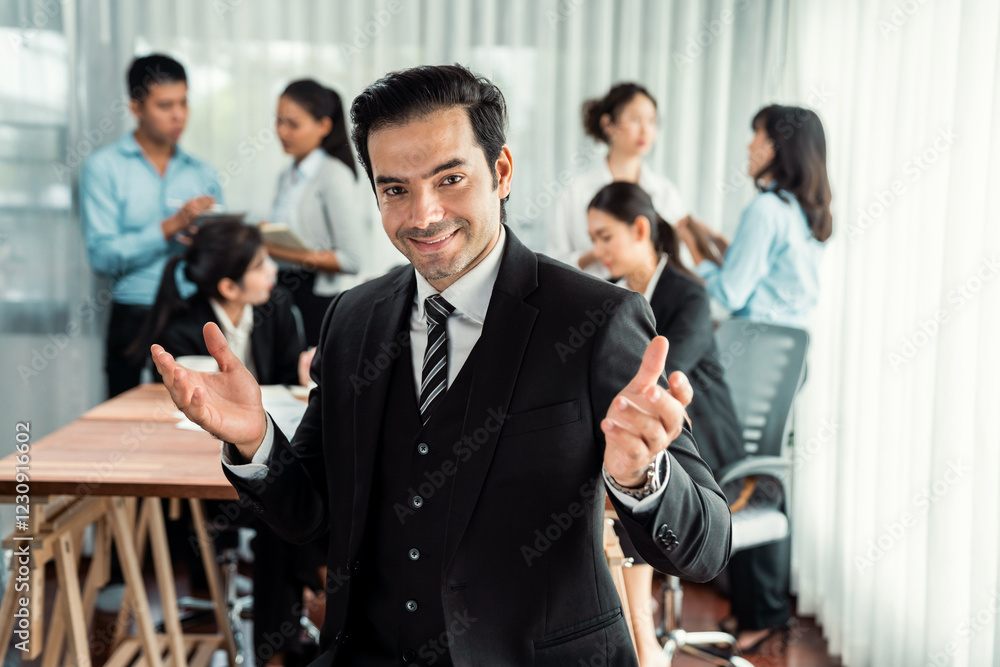 Portrait of happy businessman looking at camera with motion blur background of business people movement in dynamic business meeting. Habiliment Portrait of happy businessman looking at camera with motion blur background of business people movement in dynamic business meeting. Habiliment