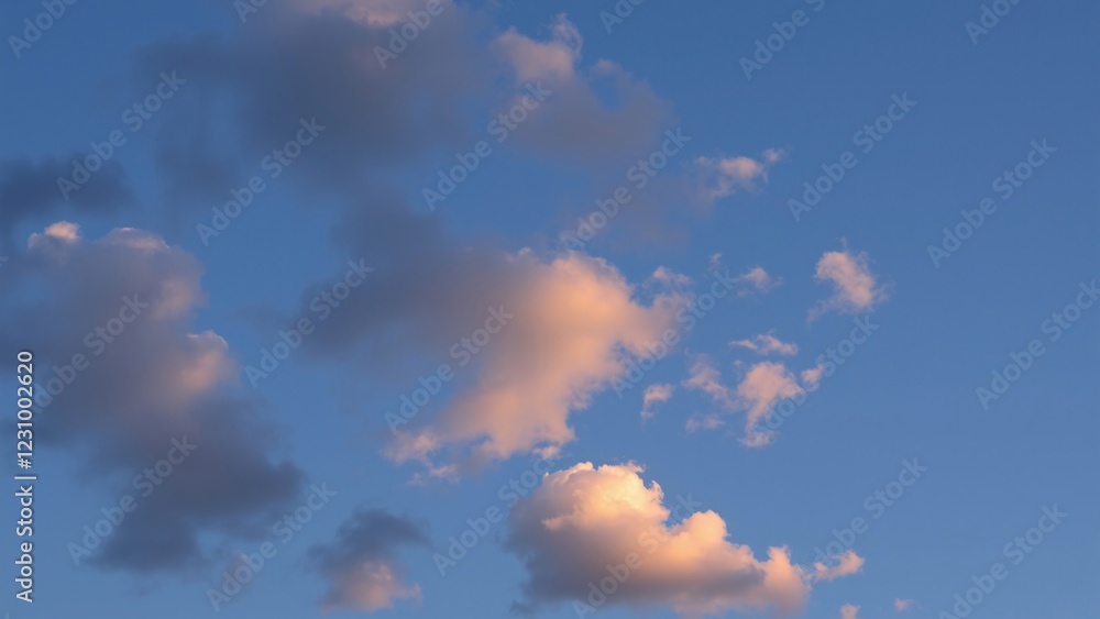 Serene Sunset Sky with Soft Pink and Gray Clouds Serene Sunset Sky with Soft Pink and Gray Clouds