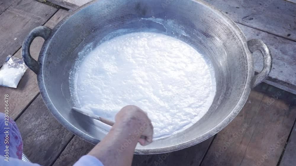 Stirring Cooking Batter in a Hot Pan, Traditional Cooking Process