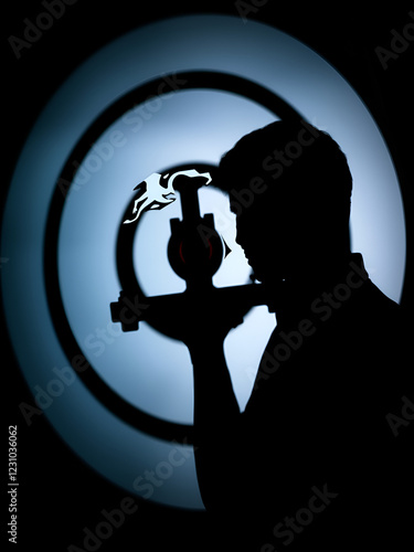 Silhouette facing target symbolizing internet slander and reputation damage. photo