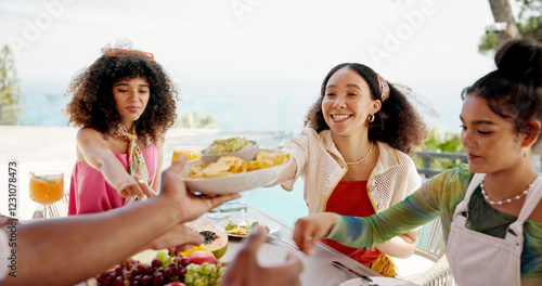 Happy people, eating or dining with food at resort for lunch, meal or get together by table. Group, hungry friends or event with smile, hospitality or passing bowl for feast, holiday party or weekend