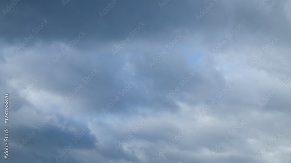 Thick cloudy abstract pattern and texture background.Natural background.Cloudy blue mixed with gray.Copy space for text.Climate and weather concept.For graphic design and banner background Thick cloudy abstract pattern and texture background.Natural background.Cloudy blue mixed with gray.Copy space for text.Climate and weather concept.For graphic design and banner background