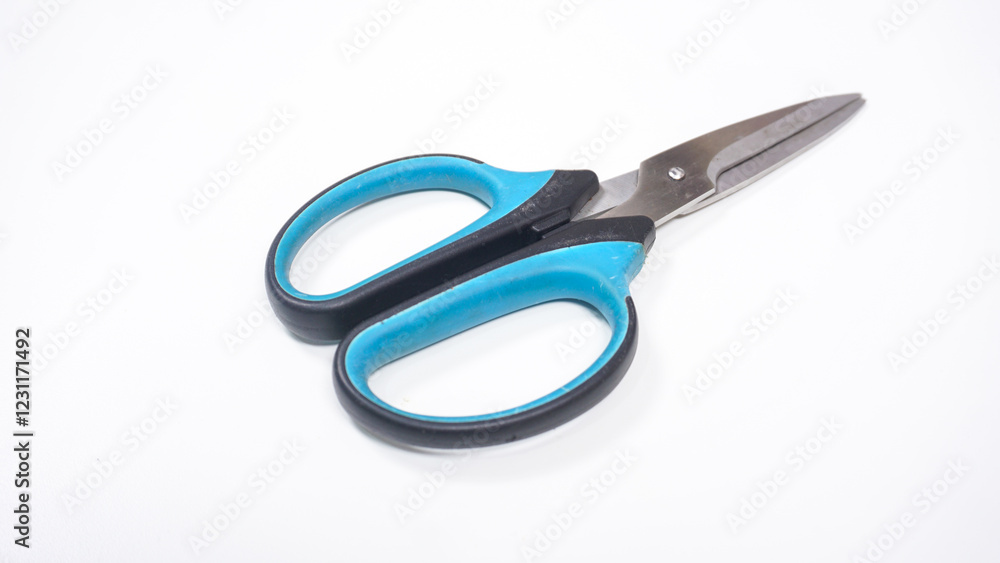 Scissor with Black and Blue Handle Isolated on White Background Scissor with Black and Blue Handle Isolated on White Background