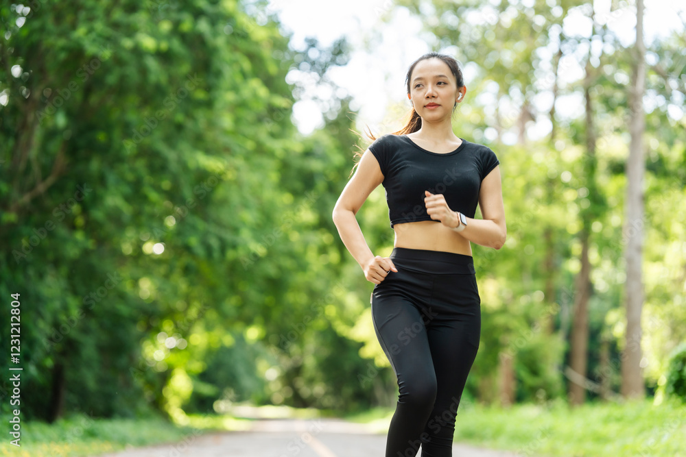 A woman in sportswear running in the park, enjoying fresh air, engaging in outdoor activities to maintain a healthy lifestyle, boosting cardiovascular health, and feeling happy and energetic A woman in sportswear running in the park, enjoying fresh air, engaging in outdoor activities to maintain a healthy lifestyle, boosting cardiovascular health, and feeling happy and energetic