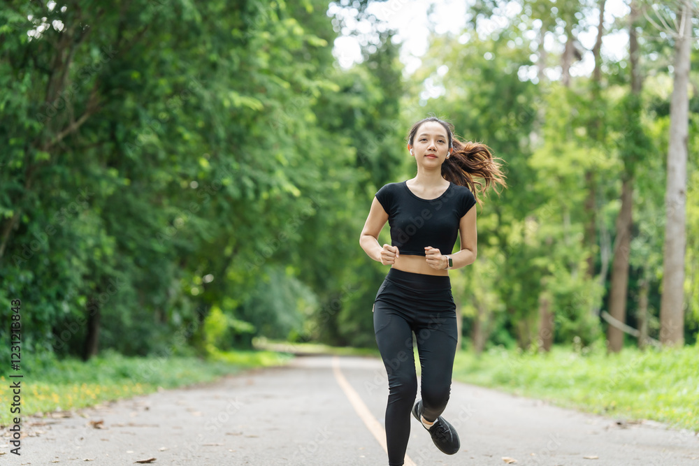 A woman in sportswear running in the park, enjoying fresh air, engaging in outdoor activities to maintain a healthy lifestyle, boosting cardiovascular health, and feeling happy and energetic A woman in sportswear running in the park, enjoying fresh air, engaging in outdoor activities to maintain a healthy lifestyle, boosting cardiovascular health, and feeling happy and energetic