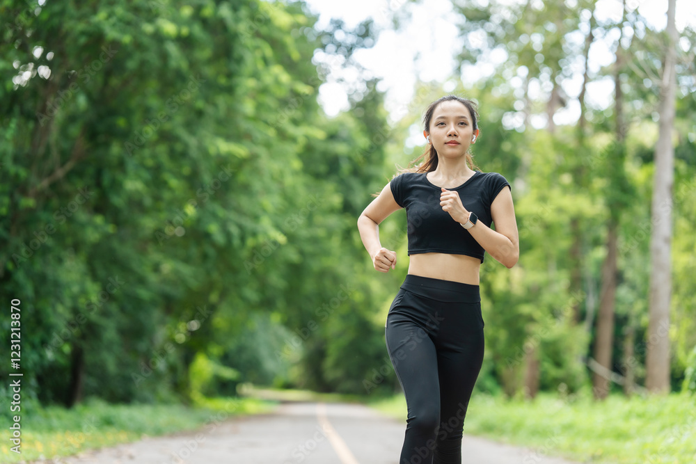 A woman in sportswear running in the park, enjoying fresh air, engaging in outdoor activities to maintain a healthy lifestyle, boosting cardiovascular health, and feeling happy and energetic A woman in sportswear running in the park, enjoying fresh air, engaging in outdoor activities to maintain a healthy lifestyle, boosting cardiovascular health, and feeling happy and energetic