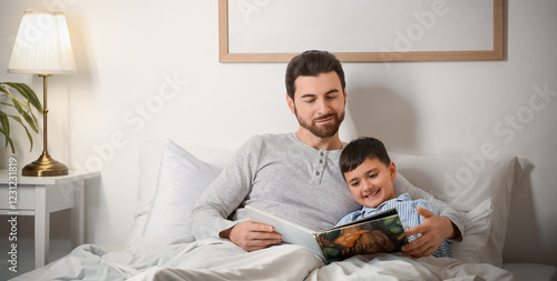 Father reading bedtime stor...
