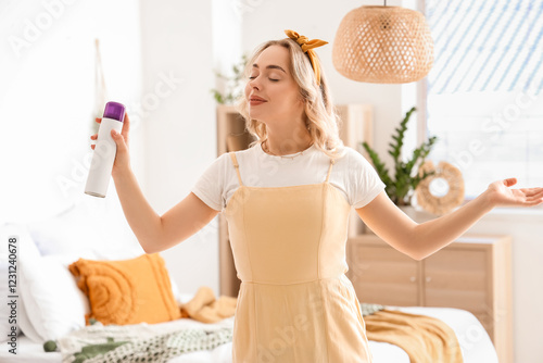 Young woman with air freshe...