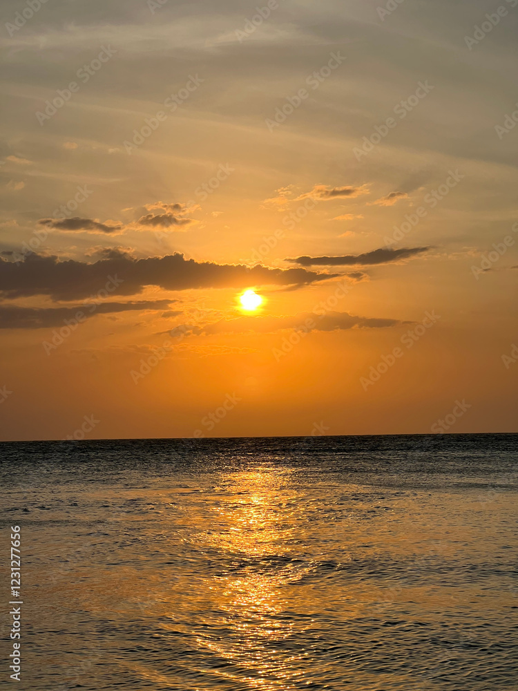 Obraz premium Atardecer en la playa 