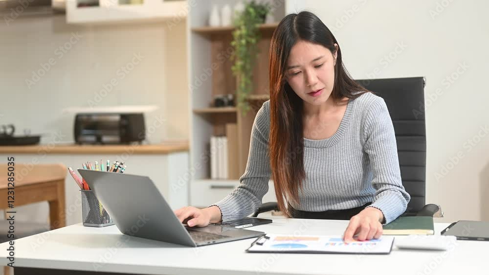 Business woman using tablet and laptop for doing math finance on an office desk, tax Business woman using tablet and laptop for doing math finance on an office desk, tax