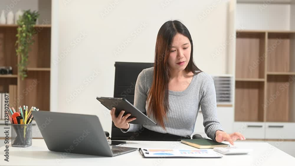 Business woman using tablet and laptop for doing math finance on an office desk, tax Business woman using tablet and laptop for doing math finance on an office desk, tax