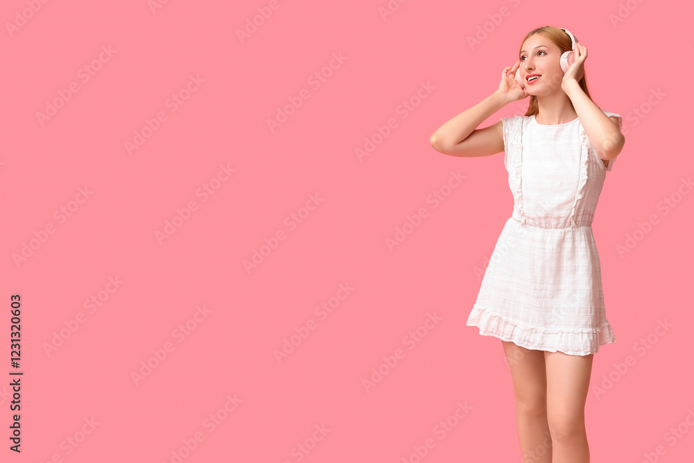 Beautiful young happy woman in stylish summer outfit and headphones on pink background Beautiful young happy woman in stylish summer outfit and headphones on pink background