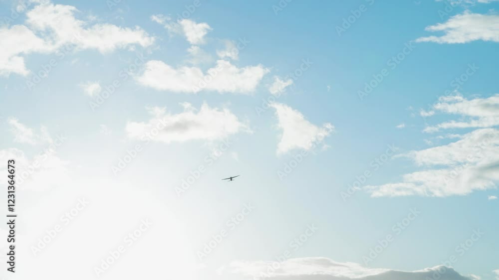 Shot of Cloudy Sky With Small Plane Flying By Shot of Cloudy Sky With Small Plane Flying By