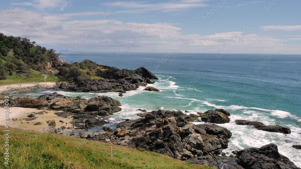 View of the rocks and ocean looking North from Tacking Point Lighthouse, Port Macquarie on a sunny day. View of the rocks and ocean looking North from Tacking Point Lighthouse, Port Macquarie on a sunny day.