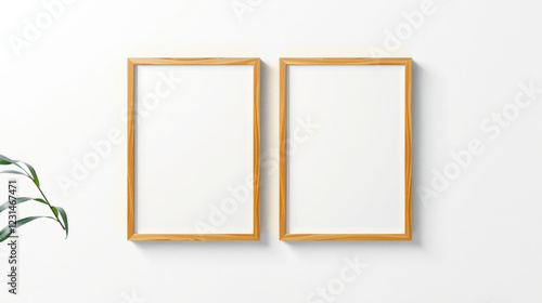 Two empty wooden frames on white wall with plant nearby, perfect for showcasing art or photos