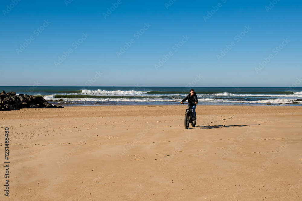 Generated imaBeautiful young girl riding an electric fat bike with her dog.ge Generated imaBeautiful young girl riding an electric fat bike with her dog.ge