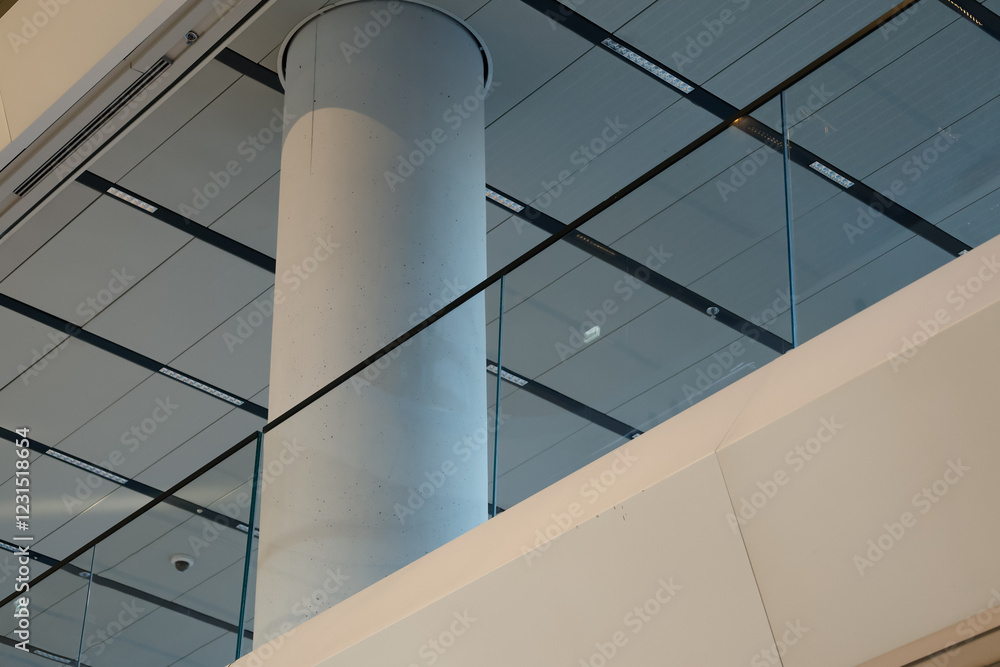 Fototapeta premium modern interior with glass railing and concrete column