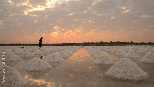 Traditional Salt flat in Madagascar, with heaps of Salt manually broken and collected photo