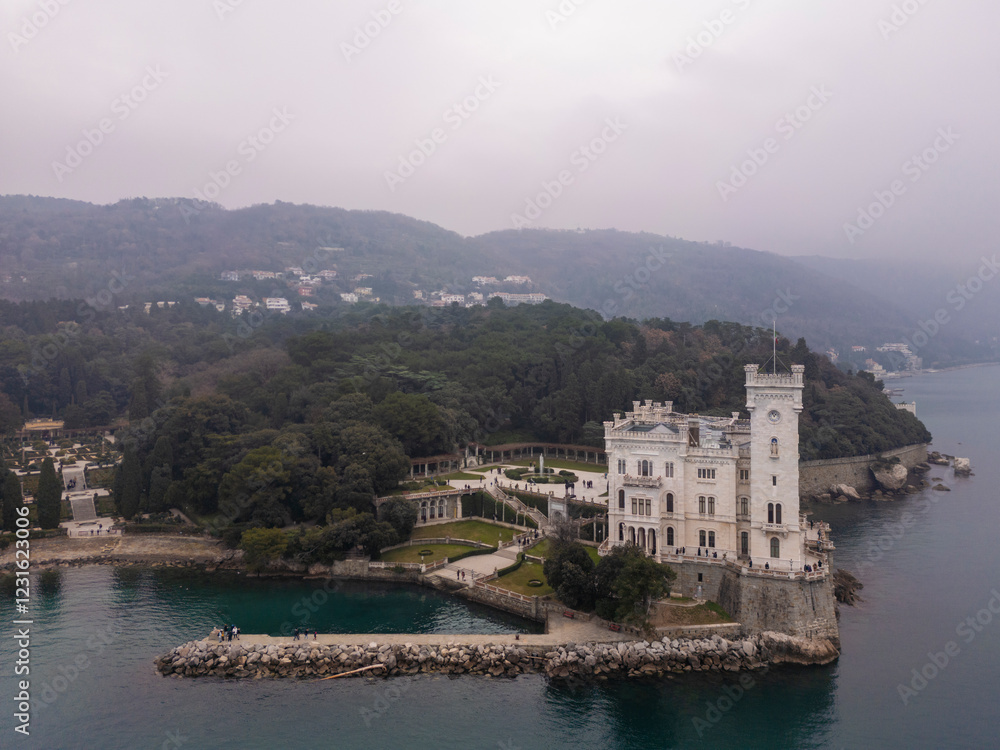 Obraz premium Aerial view of the Miramare Castle in the scenic Gulf of Trieste in Italy captured on a bright day 