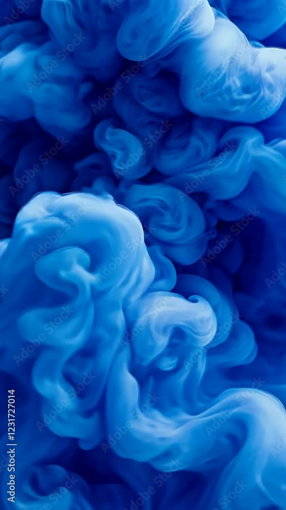 Vibrant blue swirls creating a mesmerizing abstract pattern in a fluid art composition Vibrant blue swirls creating a mesmerizing abstract pattern in a fluid art composition