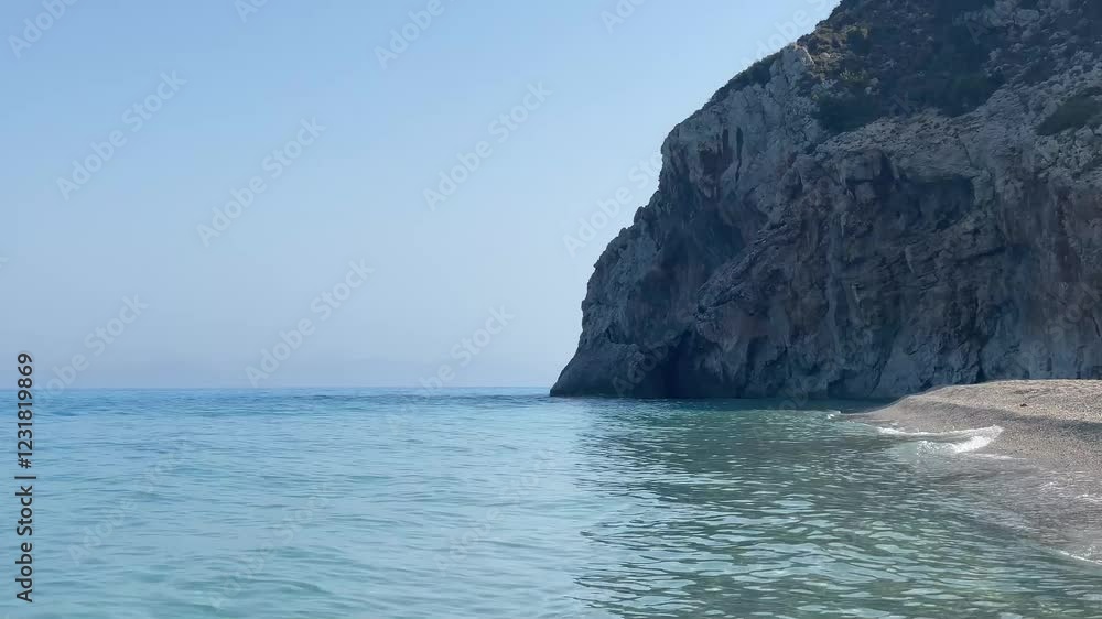 Concept of the calm and beauty of coastal life. The sea whispers secrets to the shore. Concept of the calm and beauty of coastal life. The sea whispers secrets to the shore.
