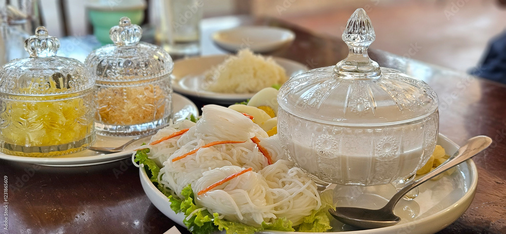 Rice Vermicelli with Coconut Milk traditional Thai noodle serving in the crystal craving glassware.