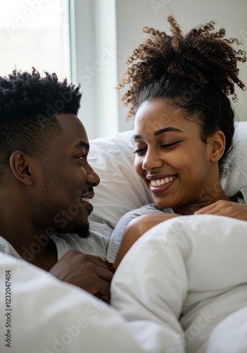 Wallpaper Mural Happy African American couple lying in bed, enjoying time together, looking at each other Torontodigital.ca