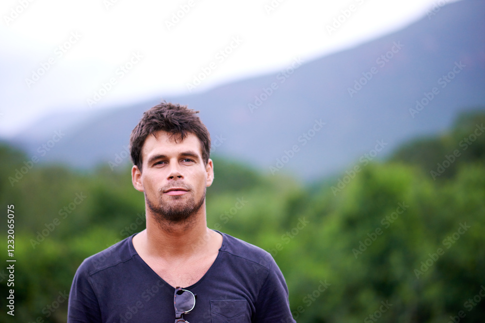 Portrait, man and hiking in nature for adventure, travel and holiday trip in countryside. Face, trekking and confident person in forest for tourism, vacation journey and exploration in New Zealand Portrait, man and hiking in nature for adventure, travel and holiday trip in countryside. Face, trekking and confident person in forest for tourism, vacation journey and exploration in New Zealand