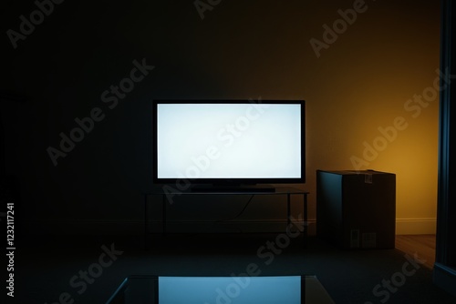Empty TV Screen in a Dark Living Room with a Package