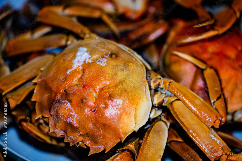 Chinese traditional cuisine, the Lunar New Year's Eve dinner, mainly consists of pork, fish and shrimp, crabs, and stir fried dishes. Top view close-up. Chinese traditional cuisine, the Lunar New Year's Eve dinner, mainly consists of pork, fish and shrimp, crabs, and stir fried dishes. Top view close-up.