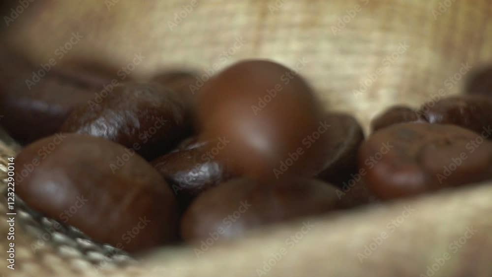 Roasted coffee beans on the table.
Roasted coffee beans on the table.