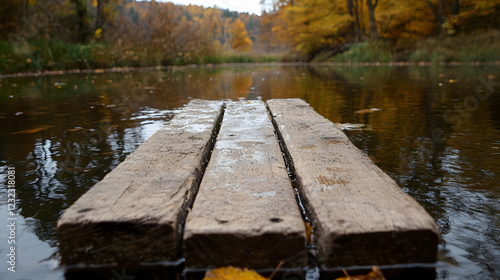 Autumn River Crossing Wooden planks path on calm water, colorful forest backdrop. Use Peaceful nature scene