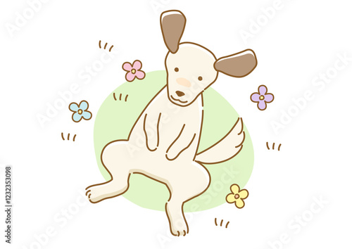 庭で寝転がる耳の垂れた犬